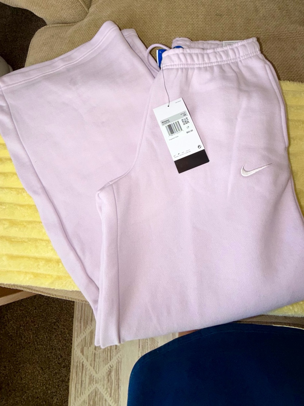 Nike woman’s Lavender Fleece Joggers with White Swoosh
